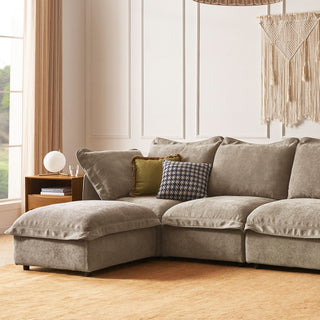Qoosh 4-seat L-shaped cloud sofa in a cozy apartment living room