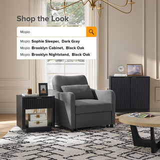 Sophie chair styled in a room, Dark Gray Fabric